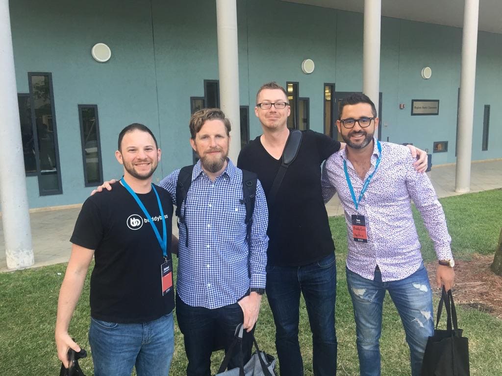Tom with Matt Mullenweg and team members at a WordCamp event